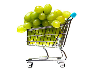 Big cluster of white fresh grapes in a metal shopping cart on white. Online shopping and purchasing...