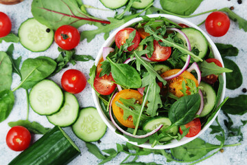 A bowl full of vegetable salad	