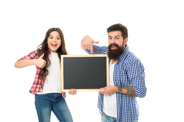 Fathers day. International childrens day. Family news. Awesome news. Small girl with dad on white background. Happy childhood. Advertising or promotion. Father and daughter hold chalkboard copy space