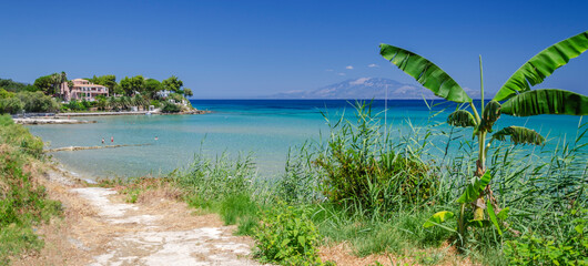 Fototapeta na wymiar Picturesque sandy beach in village Ammoudi on the east coast of Zakynthos island, Greece.