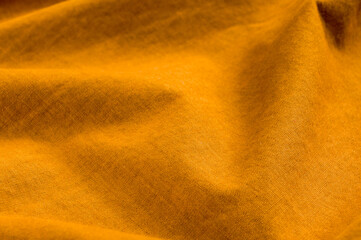 clothing items stonewashed cotton fabric texture with seams, clasps, buttons and rivets, macro