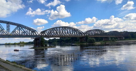 Old train bridge over Vistula River in Torun, Poland.