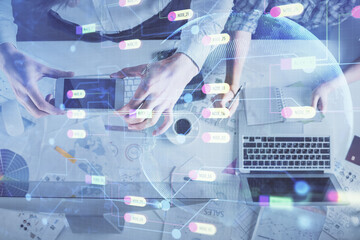 Double exposure of man and woman working together and data theme hologram drawing. Computer background. Top View.