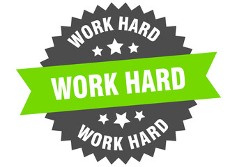 work hard round isolated ribbon label. work hard sign