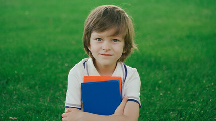 portrait of a boy with a book