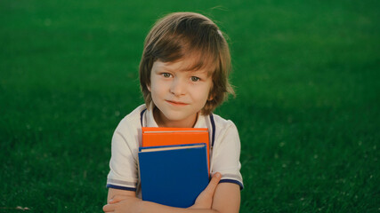 portrait of a boy with a book