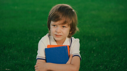 portrait of a boy with a book