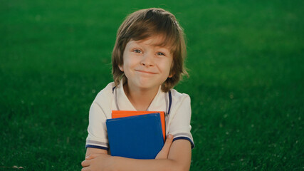 portrait of a boy with a book