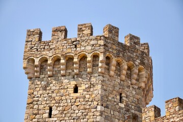 Fototapeta premium tower of the castle against blue sky 