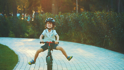 little boy riding a bike
