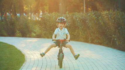 little boy riding a bike