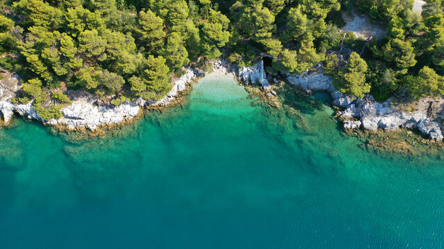 Aerial drone photo of secluded paradise sandy bay a safe anchorage for sail boats and yachts with turquoise bay, Ithaki or Ithaca island, Ionian, Greece