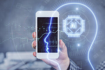 Double exposure of man's hand holding and using a digital device and brain hologram drawing. Data concept.