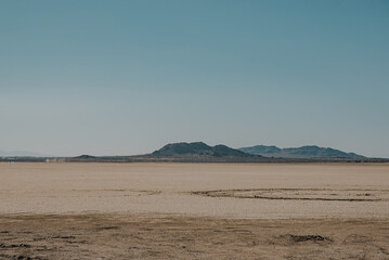 Fototapeta na wymiar El Mirage Dry Lakebed desert Landscape in mid day