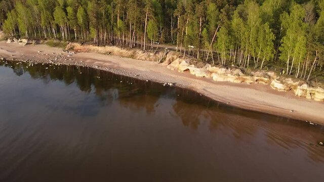 Red sandstone cliffs at Baltic sea coast Veczemju klintis aerial view