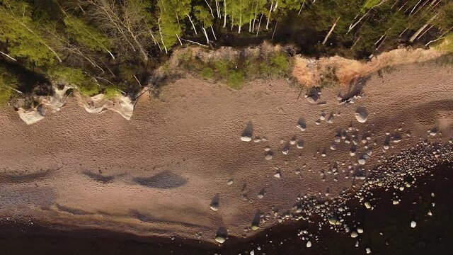 Red sandstone cliffs at Baltic sea coast Veczemju klintis aerial view