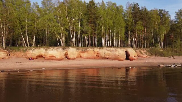 Red sandstone cliffs at Baltic sea coast Veczemju klintis aerial view