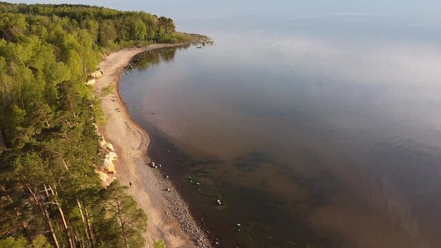 Red sandstone cliffs at Baltic sea coast Veczemju klintis aerial view