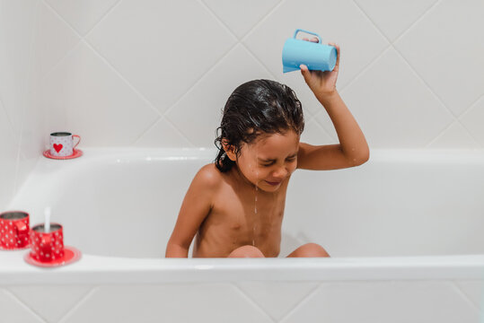 Little Hispanic Girl Taking A Shower.