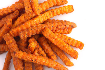 Crinkle Sweet Potatoe Fries on a White Background