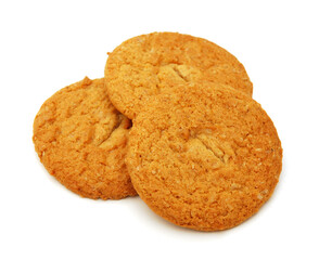 Three homemade oatmeal cookies isolated on white background
