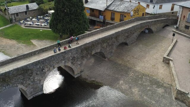 Camino de Santiago. Bridge of pilgrims in Molinaseca. Village in El Bierzo. Leon,Spain Aerial Drone Footage. 