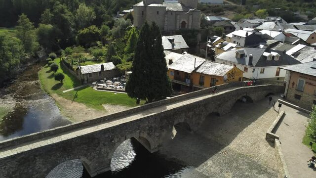 Camino de Santiago. Bridge of pilgrims in Molinaseca. Village in El Bierzo. Leon,Spain Aerial Drone Footage. 