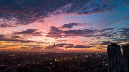 Fototapeta premium Background of colorful sky concept: Dramatic sunset with twilight color sky and clouds.