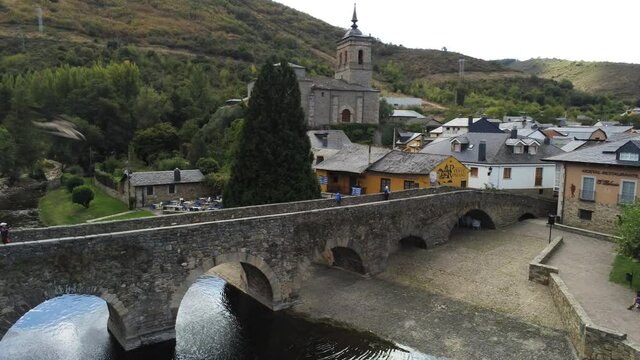 Camino de Santiago. Bridge of pilgrims in Molinaseca. Village in El Bierzo. Leon,Spain Aerial Drone Footage. 