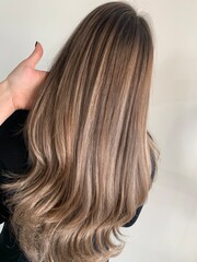 woman combing her hair