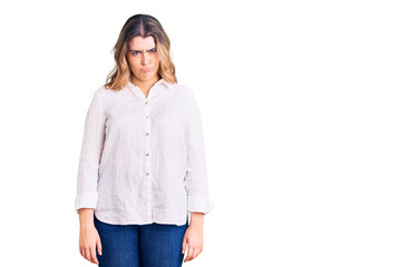Young caucasian woman wearing casual clothes skeptic and nervous, frowning upset because of problem. negative person.