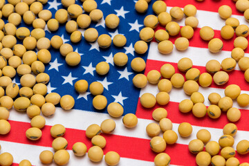 Fototapeta na wymiar Flag of United States of America covered in soybeans. Concept of American agricultural imports, exports, trade, trade war, tariffs, production and commodity markets, CUSMA and NAFTA trade agreements