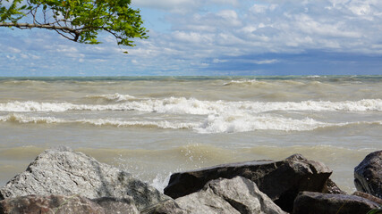 High winds churn up waves on Lake Michigan's Illinois shoreline. The water was closed at local beaches due to rough surf.
