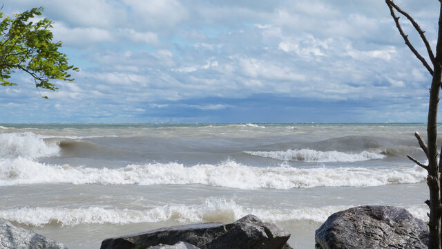 High winds churn up waves on Lake Michigan's Illinois shoreline. The water was closed at local beaches due to rough surf.