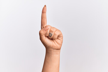 Hand of caucasian young woman counting number one using index finger, showing idea and understanding