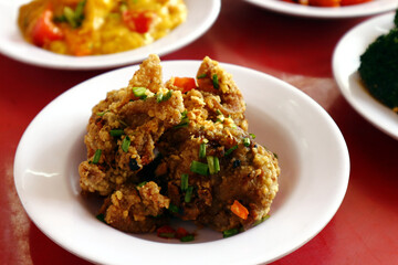 Freshly made crispy deep fried chicken on a plate