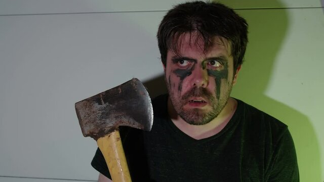 crazy weird guy with axe