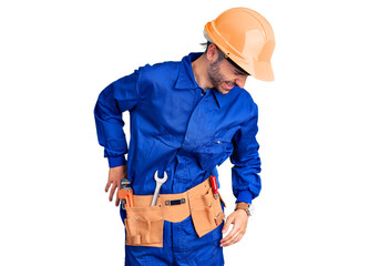 Young hispanic man wearing worker uniform suffering of backache, touching back with hand, muscular pain