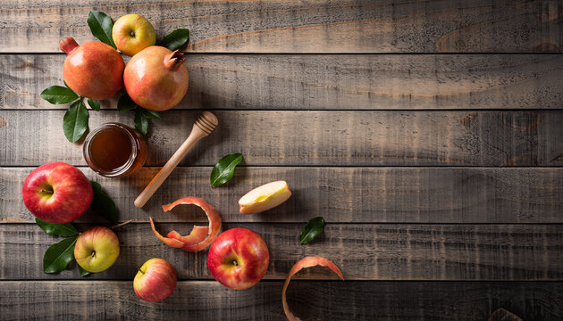 Rosh hashanah (Jewish New Year holiday), Concept of traditional or religion symbols on dark wooden background.