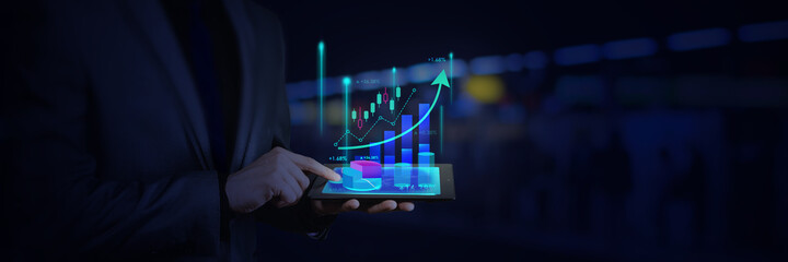 business man tablet on hand candle stick graph chart.