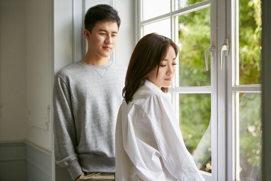 young asian couple staying at home