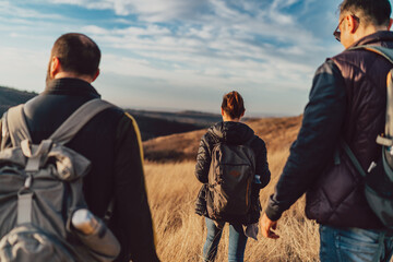 Group of friends hiking in nature