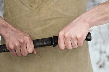 an army knife in the hands of a soldier