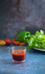 Salad dressing on  cup.