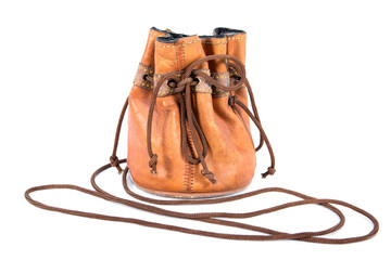 Leather drawstring bag with string tied the knot isolated on white background. Old brown leather...