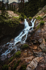 Waterfall in the rocky mountains of colorado on a sunny day. Beautiful lone falls in the mountains