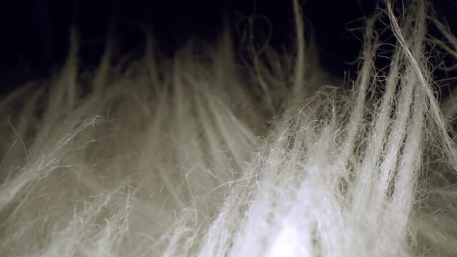 Motorized moving shot of artificial fur rug, shot with macro probe lens
