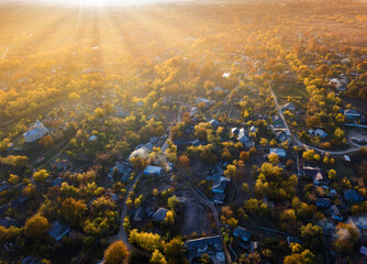Fototapeta na wymiar Panorama scenic aerial green little village at sunset