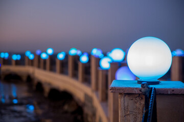 lanterns on the pier in the sea