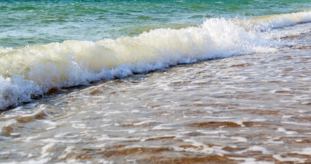 ocean sea waves on sandy beach